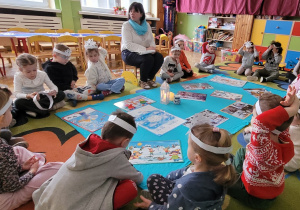 Rozmowa o zimie w oparciu o wiersz, ilustracje i doświadczenia dzieci.